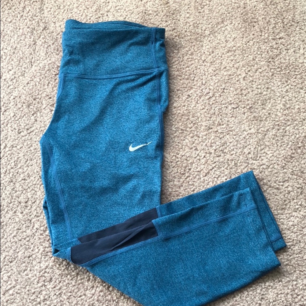 Nike Dri Fit blue capris with mesh details on back